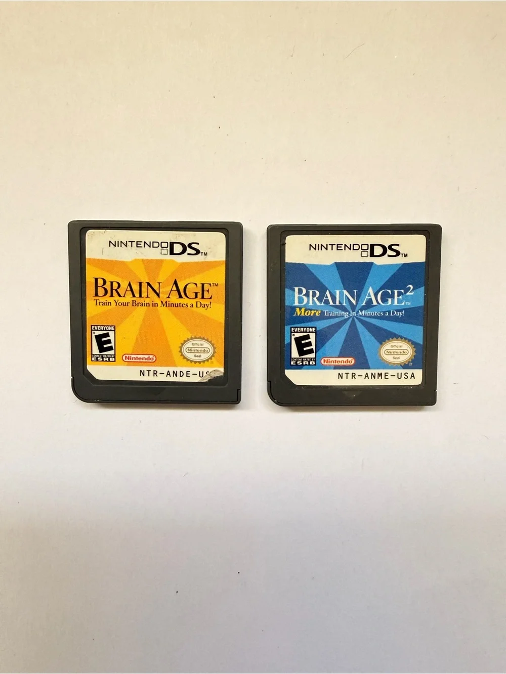 Nintendo DS Brain Age Bundle - Yellow & Blue Game Cards